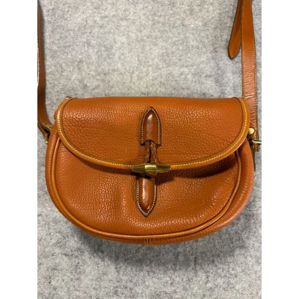 Vintage Dooney & Bourke All Weather Leather British Tan Saddle Crossbody Bag USA